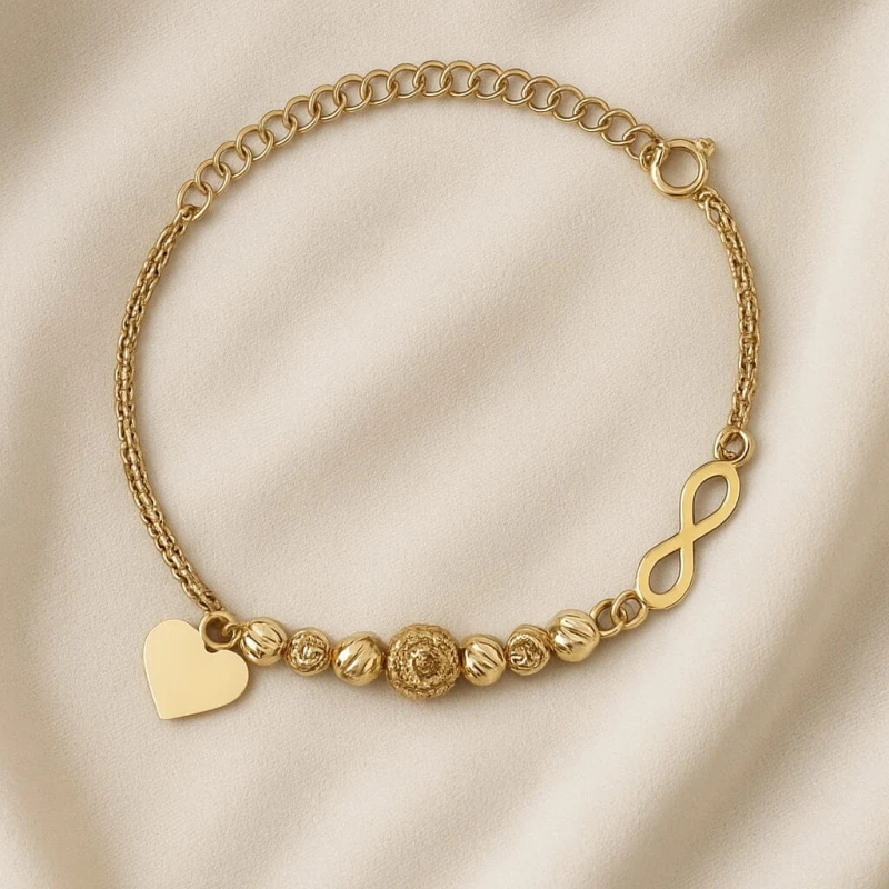 SREBRNA POZŁACANA BRANSOLETKA Z KULKAMI, SERCEM I NIESKOŃCZONOŚCIĄ 925 – 1,5MM