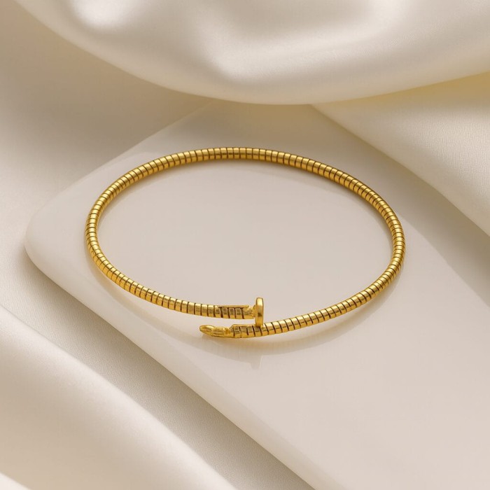 SREBRNA POZŁACANA BRANSOLETKA ELASTYCZNA GWÓŹDŹ 925 585 - 2,1MM