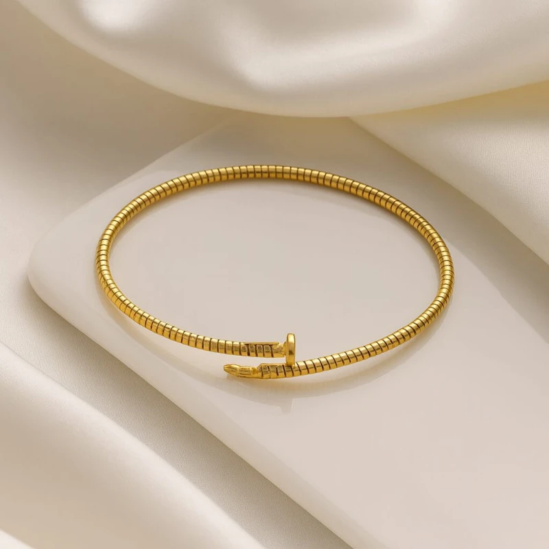 SREBRNA POZŁACANA BRANSOLETKA ELASTYCZNA GWÓŹDŹ 925 585 - 2,1MM
