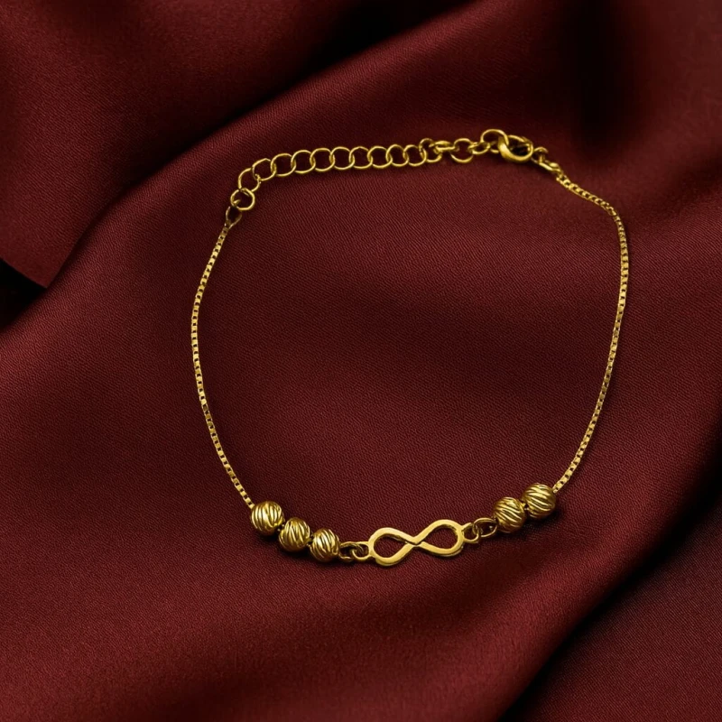 SREBRNA POZŁACANA BRANSOLETKA KOSTKA Z KULKAMI I NIESKOŃCZONOŚCIĄ 925 – 0,7MM